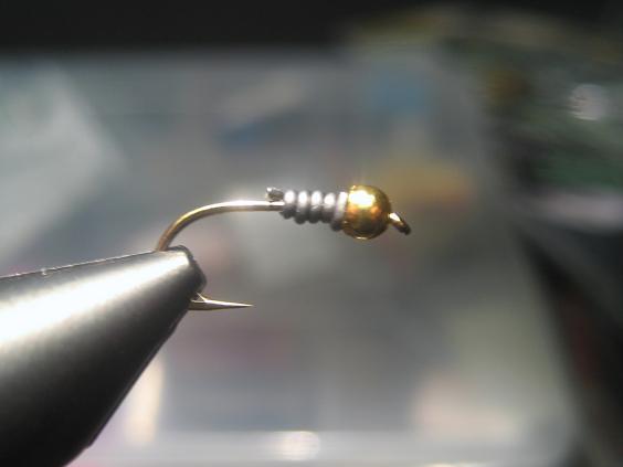 kierrä lyijyä pari kierrosta kuulan taakse